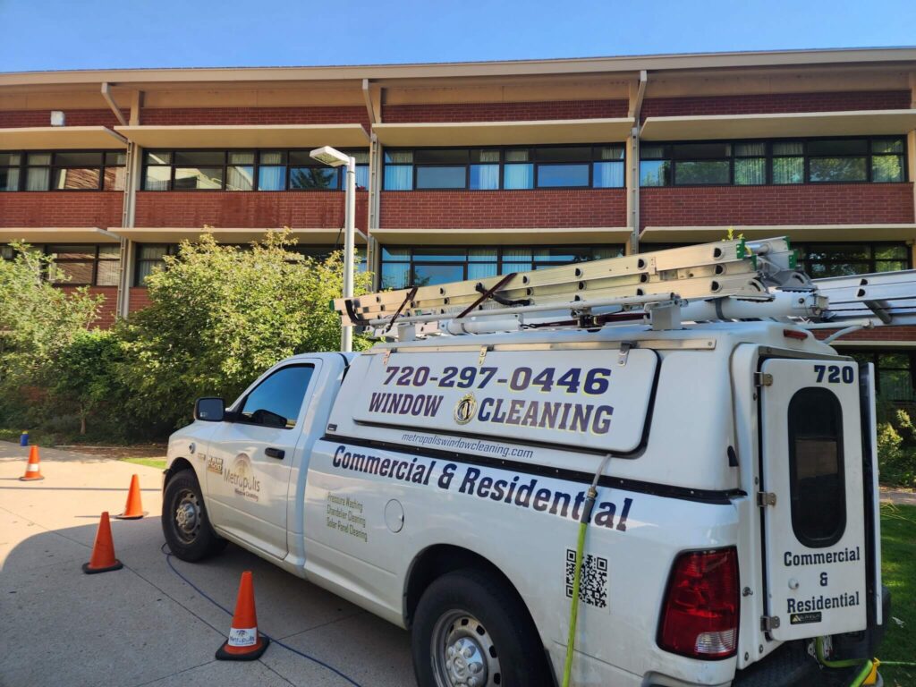 Metropolis window cleaning truck on site at a commercial window cleaning job in Colorado